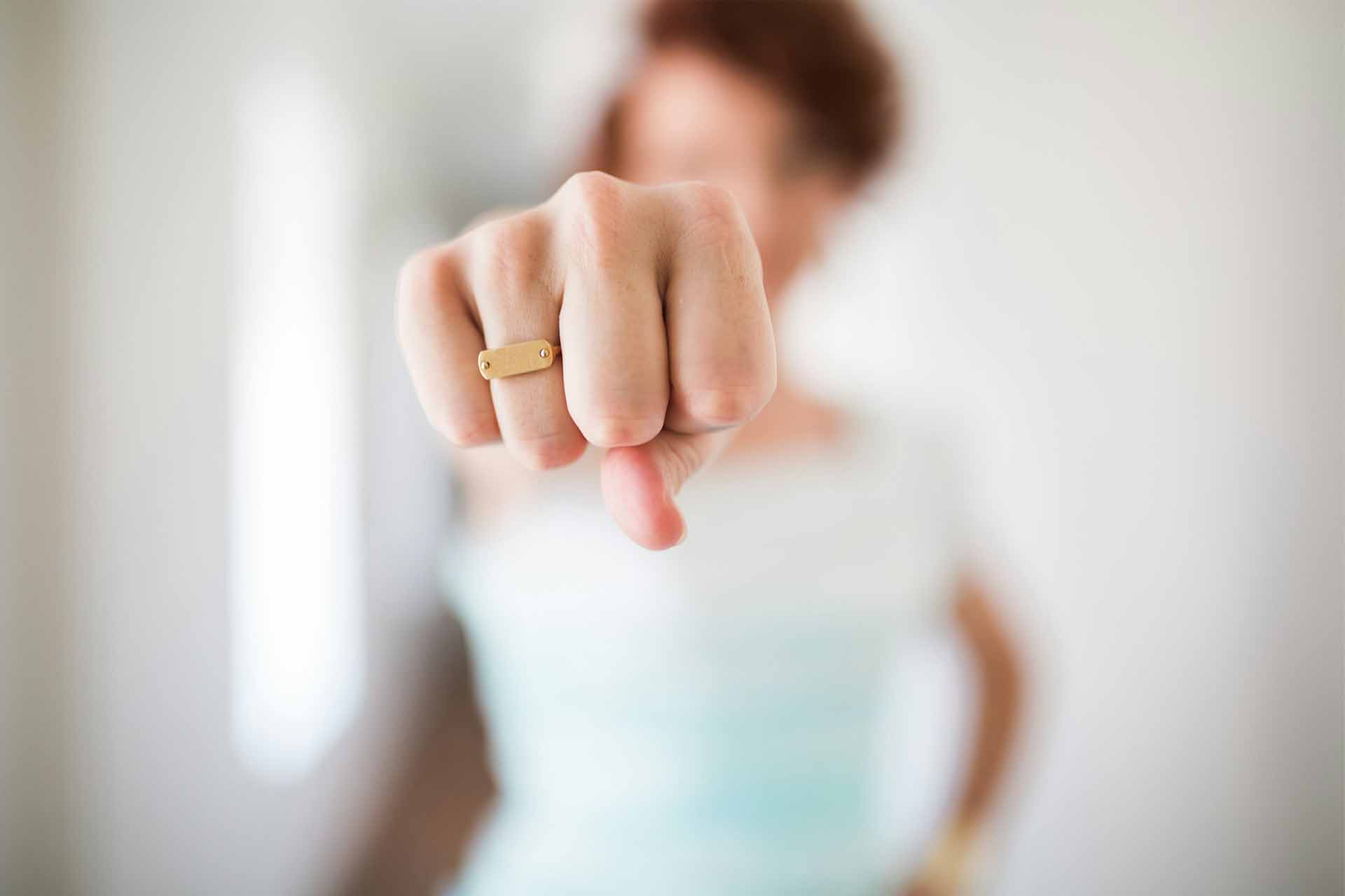 Workshops 6 A woman giving a fist bump to the camera.